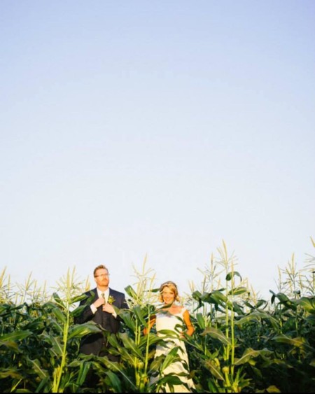 Kurt Braunohler and his spouse, Lauren Cook walking down the aisle